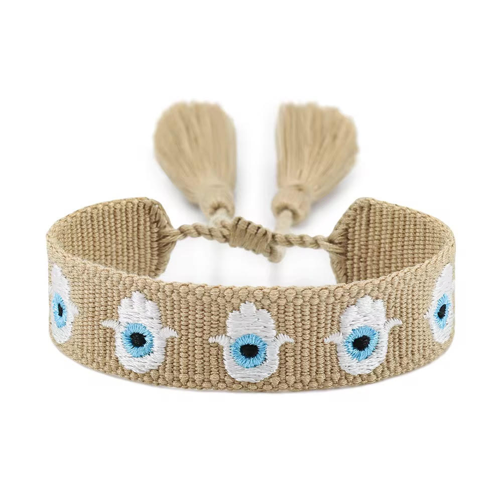 Evil Eye Woven Bracelet with Tassle - Style and Protection - Image 3